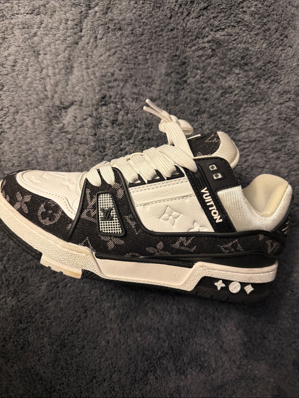 Louis Vuitton men’s  Black & White Monogram Low-Top influence